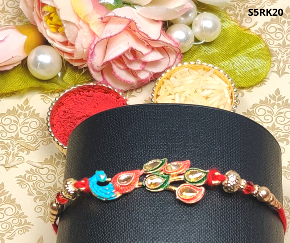 Antiquepeacock stone studded Metal Rakhi