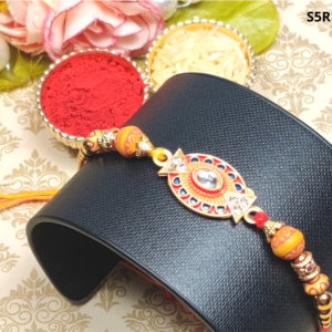 Antique Oval Shaped Stone Studded Metal Rakhi