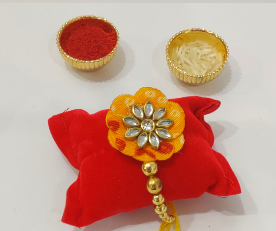 Orange Bandhani Kundan Rakhi